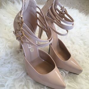 Nude buckle strapped heels